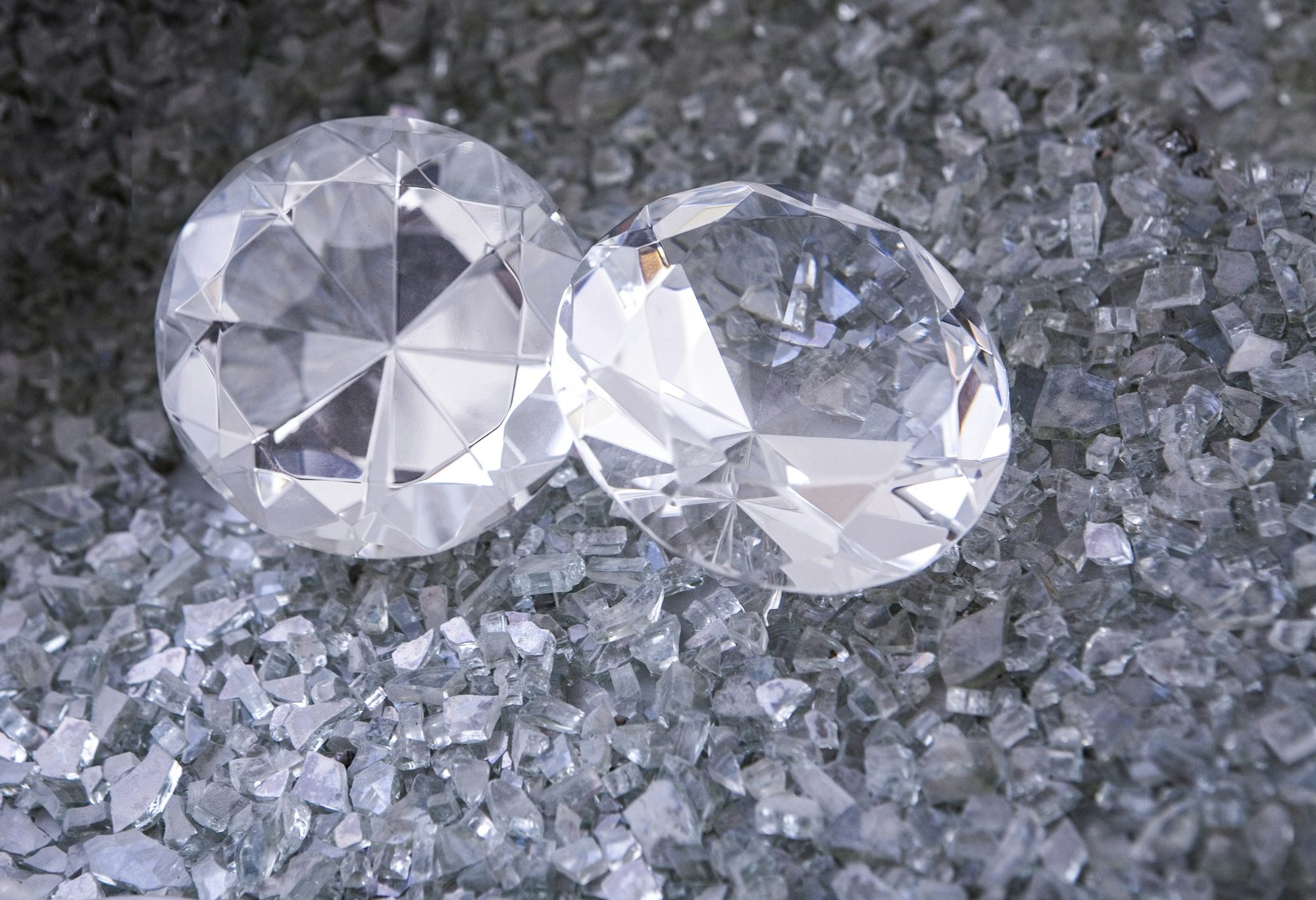 Diamonds set out for assessment against a light background